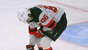 J. Hughes exits Devils' 2-0 loss after collision