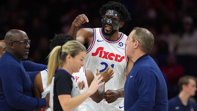 Embiid ejected in chaotic opening half in Philly