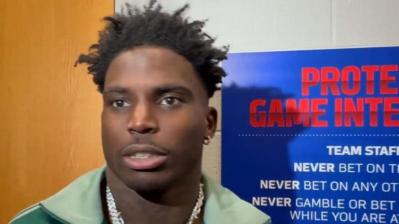 Hill sits in 4th quarter, hints at leaving Miami