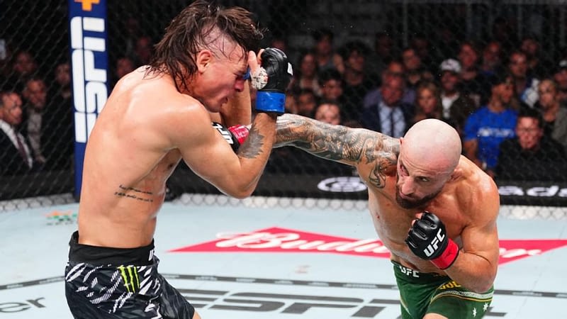 Volkanovski wins vacant title in slugfest with Lopes