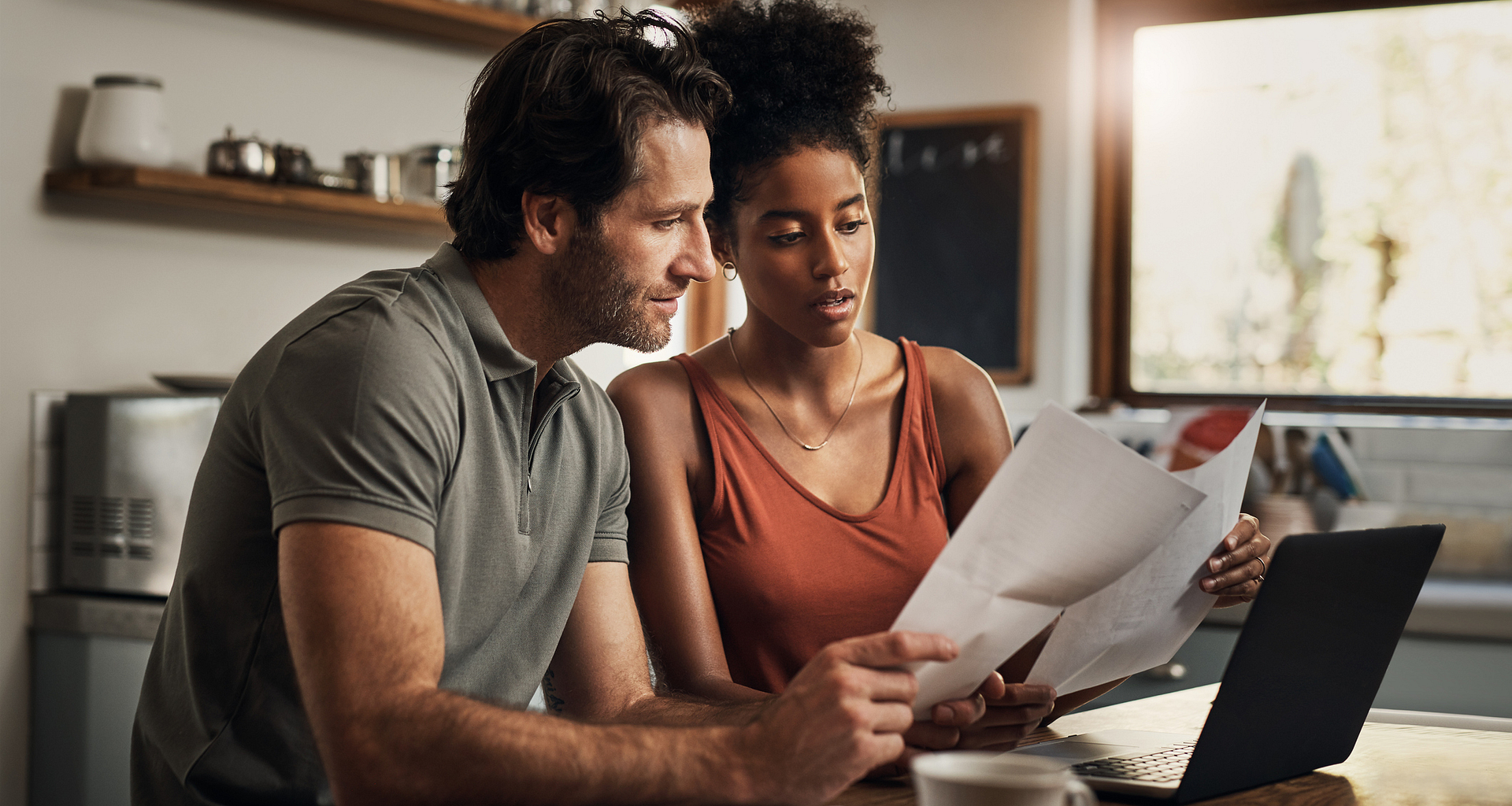 couple looking at paperwork together