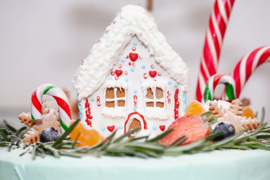 a gingerbread house decorated with icing