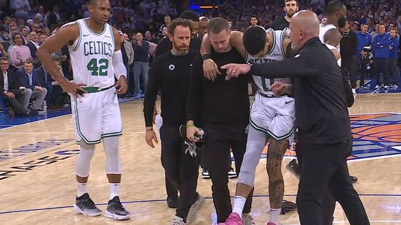 Celtics' Tatum carried off in Game 4 with leg injury