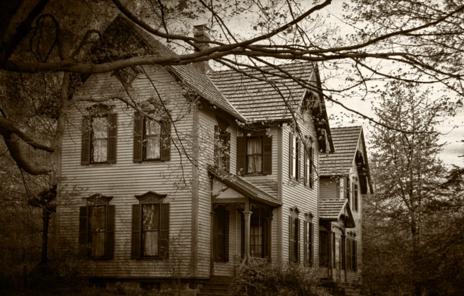 an abandoned haunted looking house