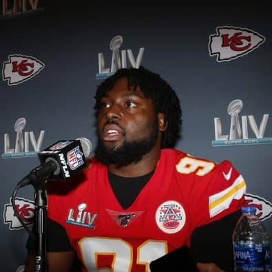 Kansas City Chiefs nose tackle Derrick Nnadi (91) speaks during a news conference on Thursday, Jan. 30, 2020, in Aventura, Fla., for the NFL Super Bowl 54 football game. (AP Photo/Brynn Anderson)