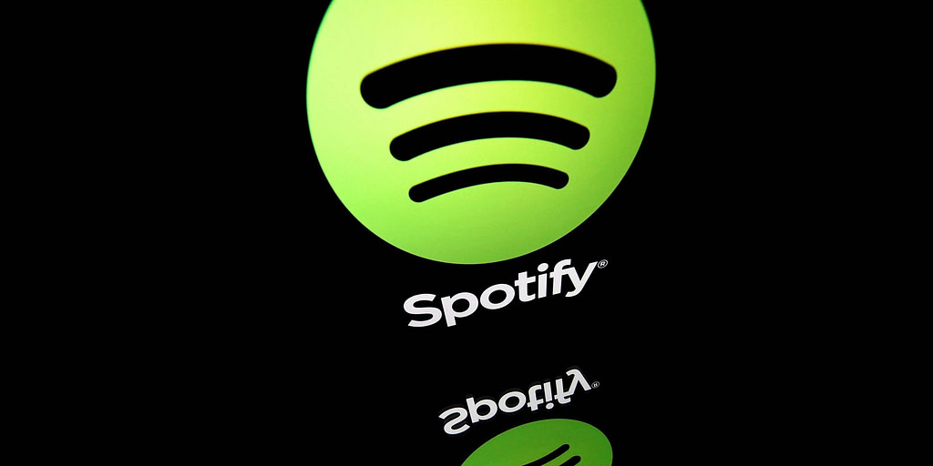 "Robot DJs? Spotify Introduces AI-Powered Tool for Personalized Music Mixes" - Credit: USA Today