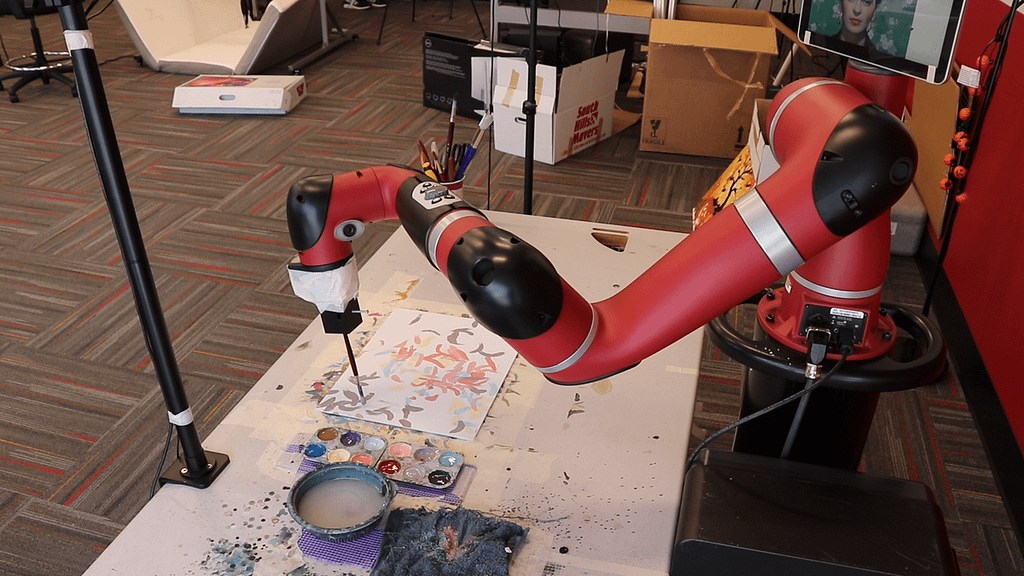 "Humans and AI-Powered Robot Arm Team Up to Create Unique Paintings" - Credit: Gizmodo
