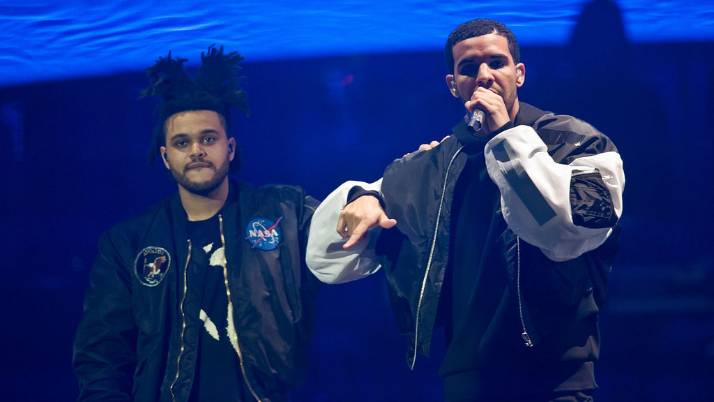 Copyright In Spotlight After Platforms Pull AI Song Featuring Fake Drake And Weeknd - Credit: Axios