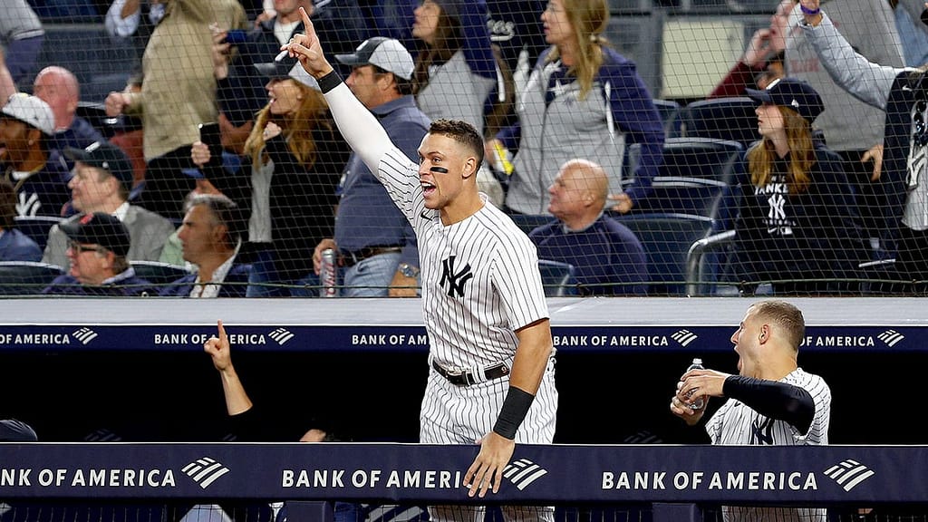 Aaron Judge misses 61 by a few feet, Yankees clinch playoff berth in walk-off win over Red Sox