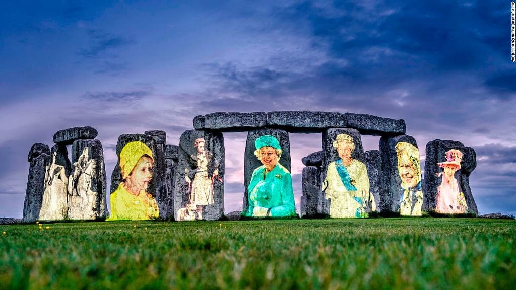 'Completely unhenged': Stonehenge lights up with portraits of the Queen