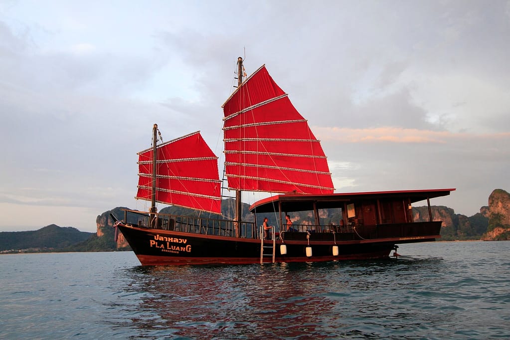 a close up of krabi sunset cruises boat just before sunset