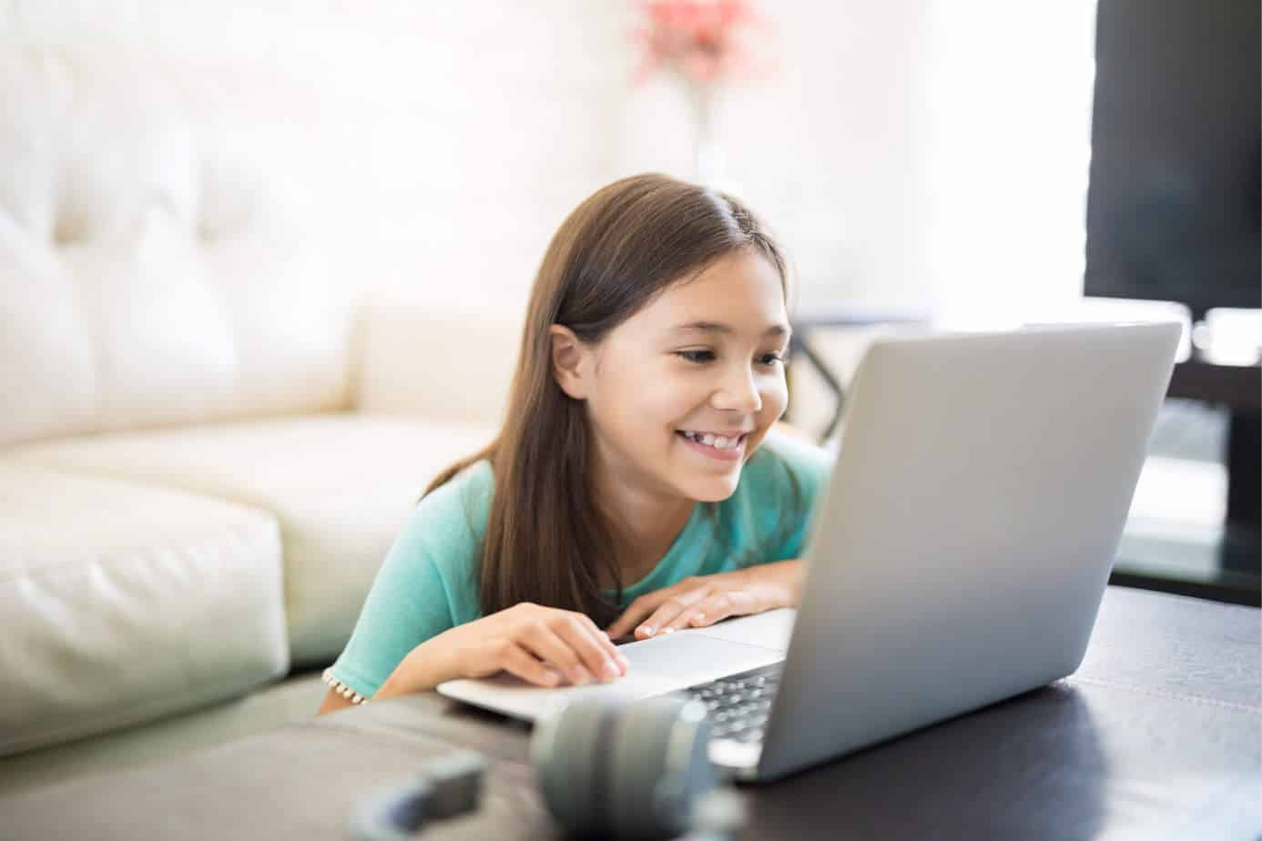 Create a Gmail Account for a Child - preteen girl on a computer