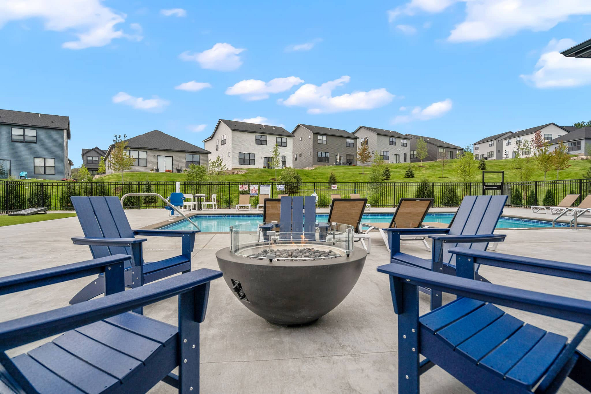 enjoy the sunshine by the fire pit and pool