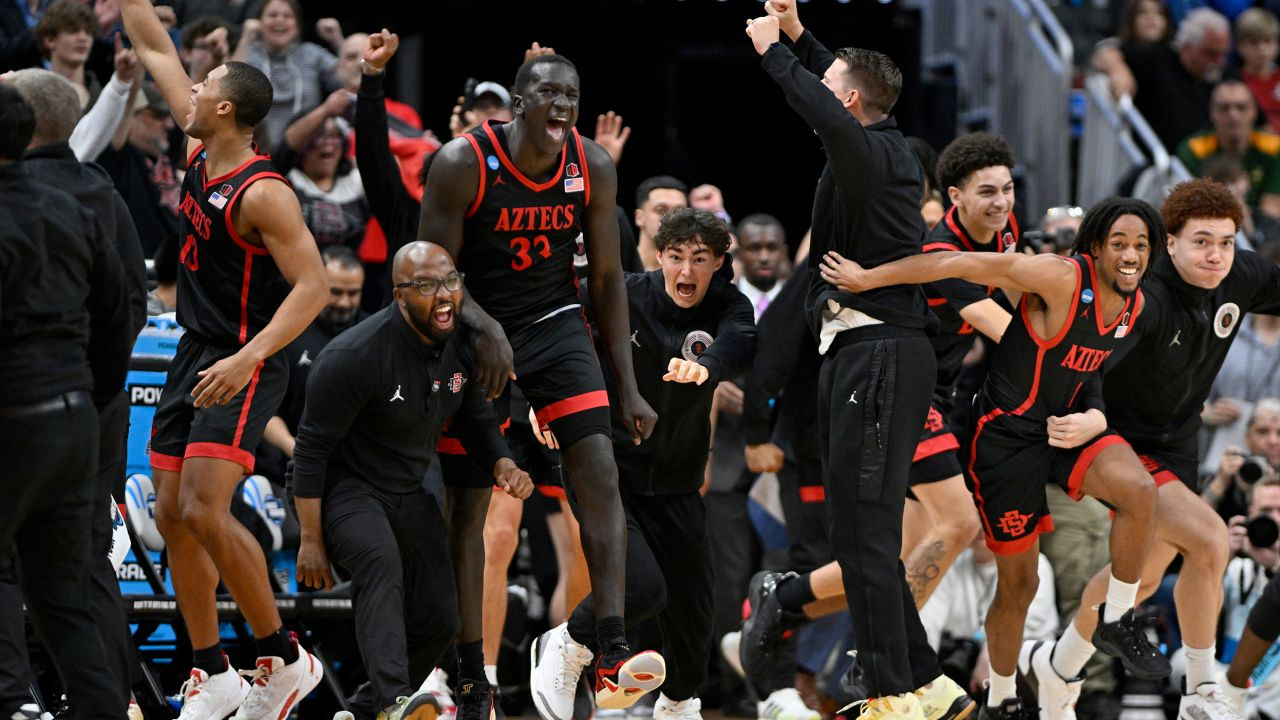  San Diego State Aztecs players celebrate defeating the Alabama Crimson Tide in the men's NCAA tournament third round.