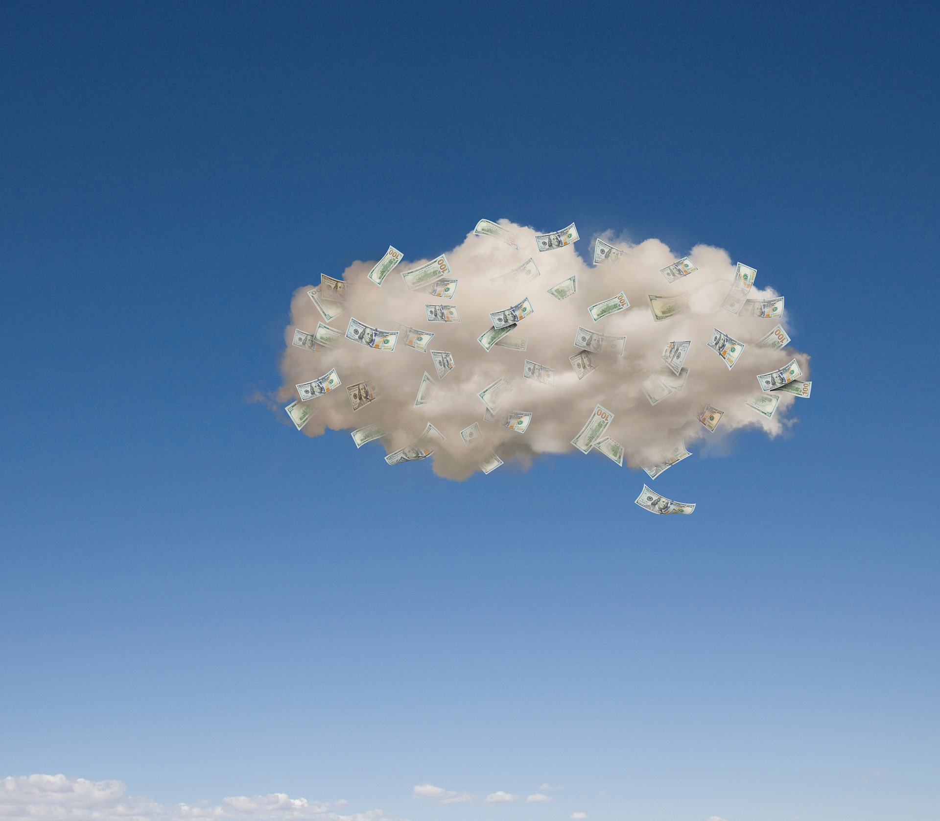 Image of money floating in a cloud against a blue sky.