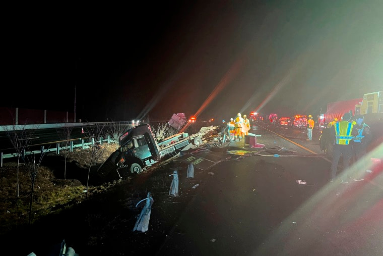 Emergency personnel at the scene of a crash on Interstate 64 in York County, Va.