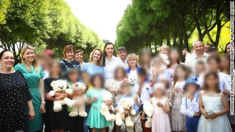 The Office of the Children's ombudsman for the Moscow Region released this image alongside a statement that announced 14 children from Donbas received Russian citizenship in July. CNN obscured portions of this image to protect the identity of the children. 