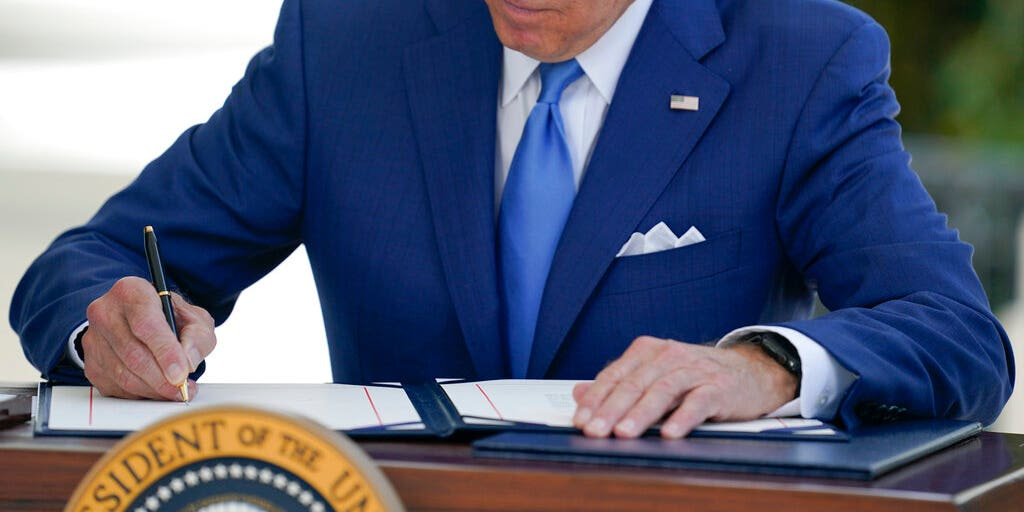 Biden's Executive Order for 'Woke' AI Labeled 'Social Cancer' - Credit: Fox News