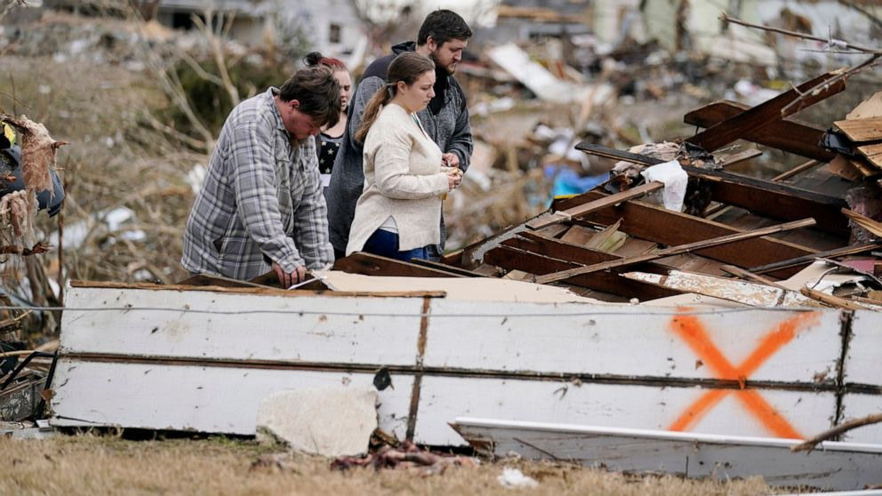 Kentucky remembers tornado victims as rebuilding continues