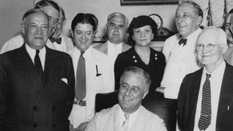 President Franklin D. Roosevelt signs the Social Security Act on August 14, 1935. 
