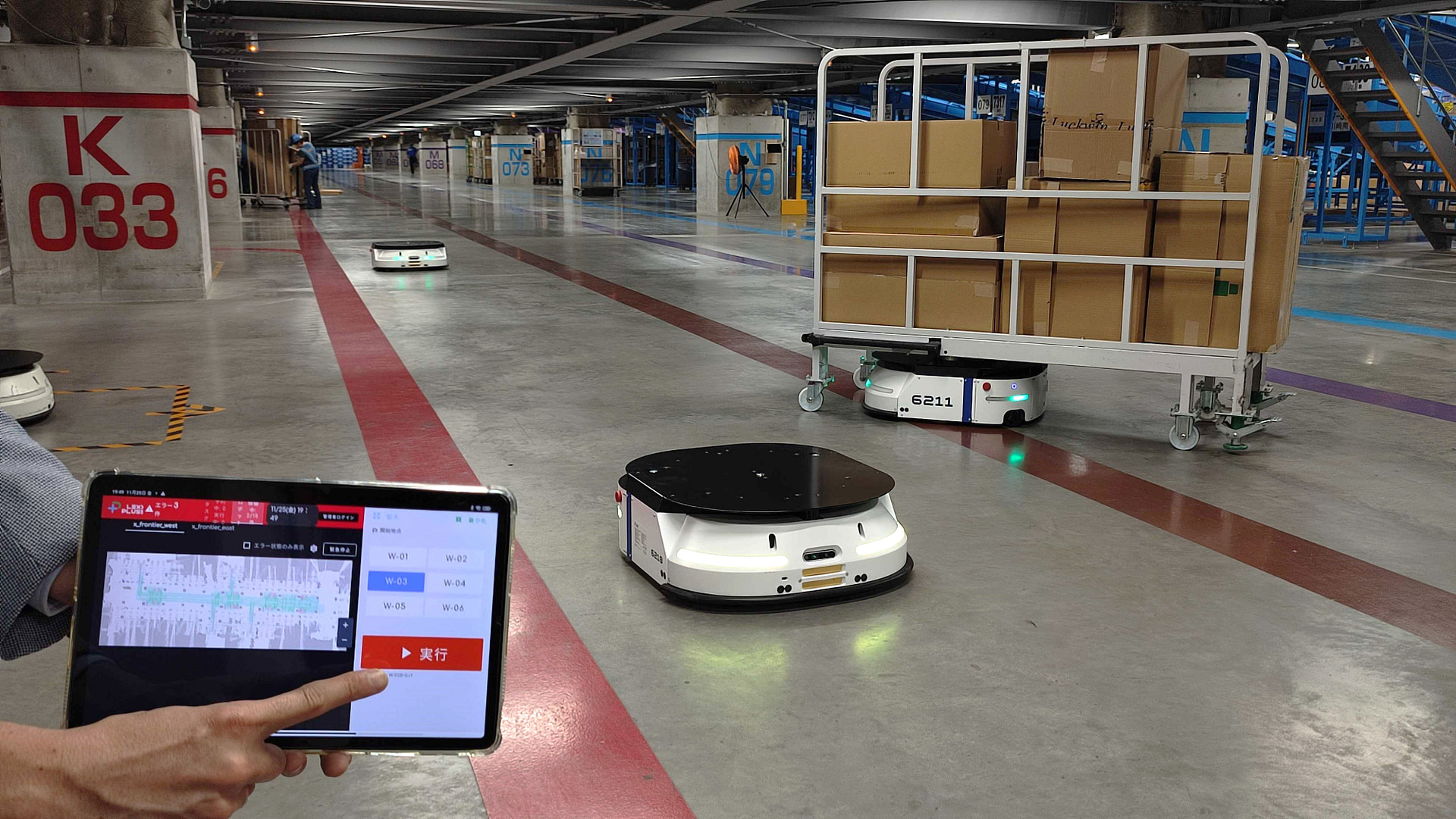 LexxPluss warehouse robots travels down aisle