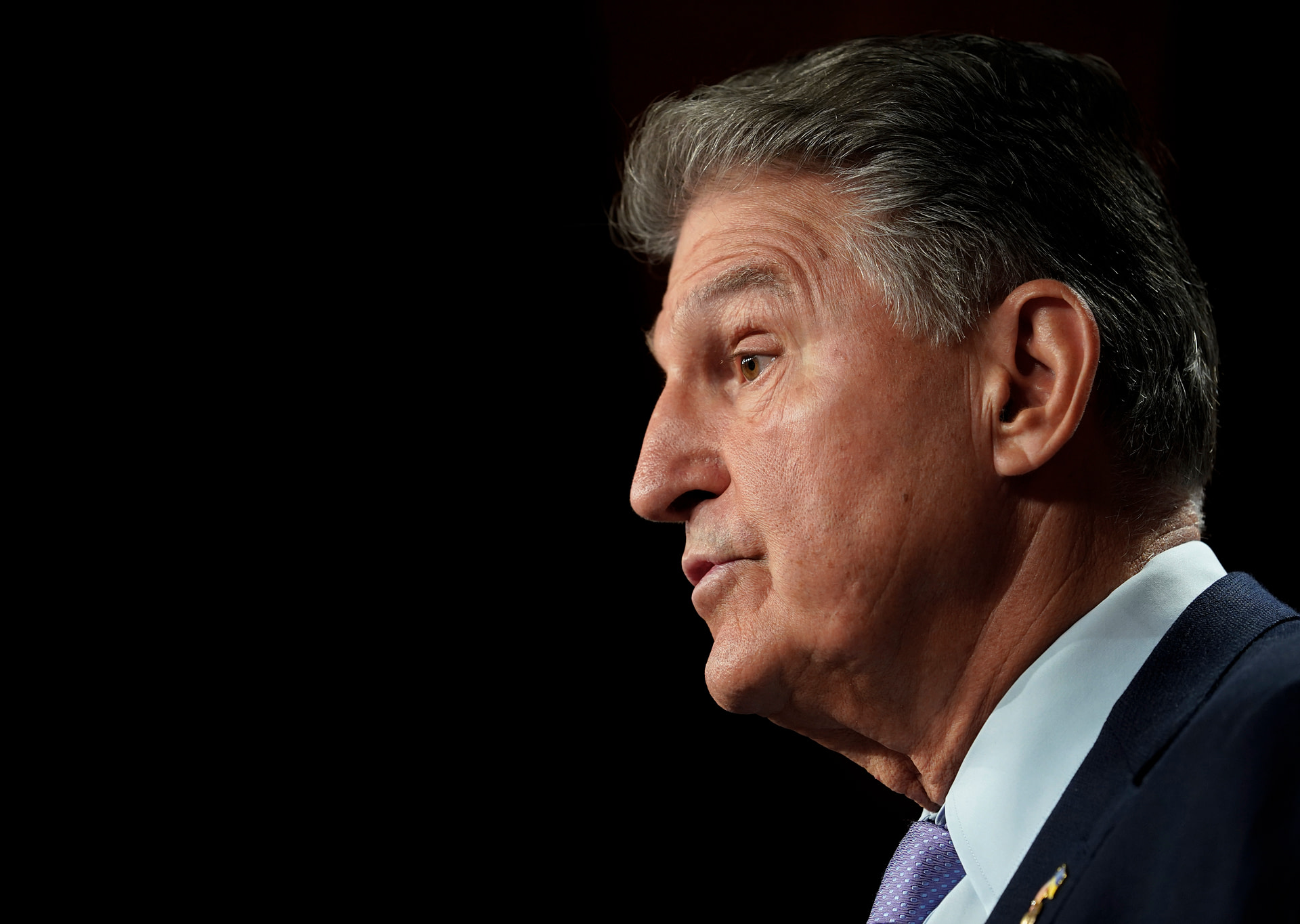 Senate moves forward to fund government despite snags over Manchin’s energy plan