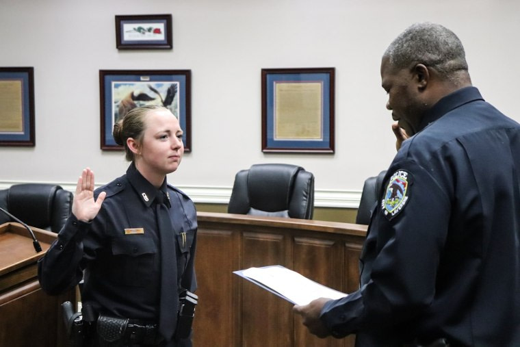 Officer Maegan Hall being sworn in by Chief Davis of the La Vergne Police Department in Tennessee on Aug. 19, 2021.