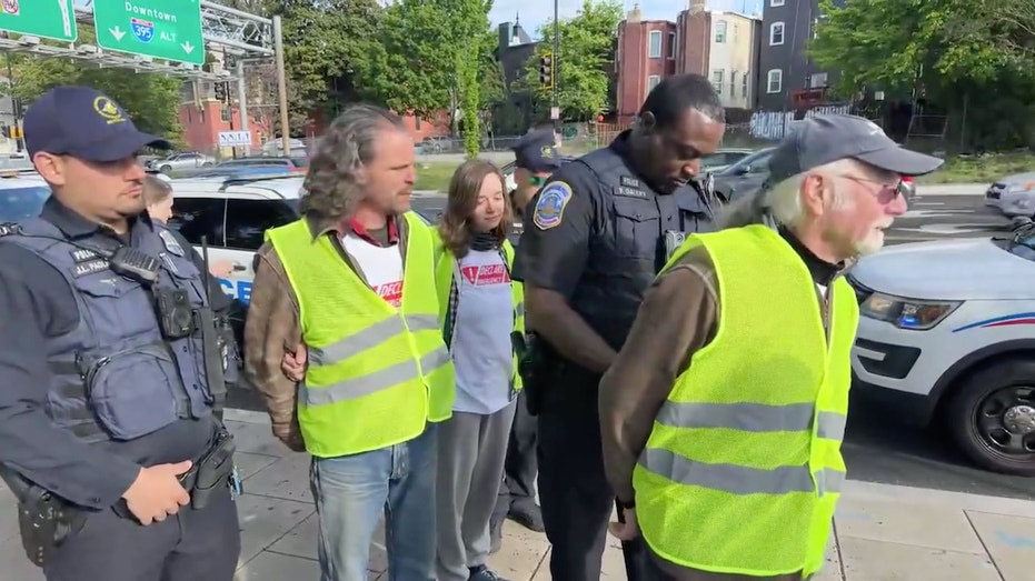 Climate activists arrested after blocking rush-hour DC traffic